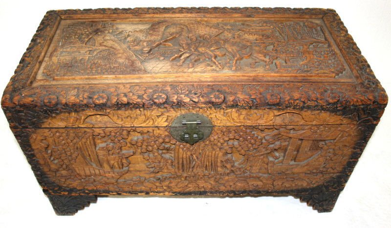 Vintage Chinese Carved Camphor Wood Chest: Vintage Chinese Carved Camphor Wood Chest with highly detailed battle scene on top. Measures - 34 1/2" long x 17" wide x 19 1/2" high.