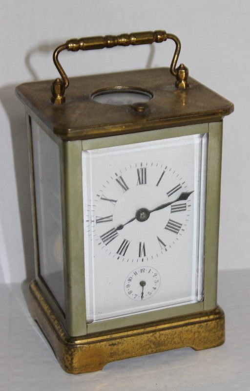 Large French Repeating Brass Carriage Clock: Large French Repeating Brass Carriage Clock. Measures - 7" high x 3 3/4" wide x 3 1/2" deep.