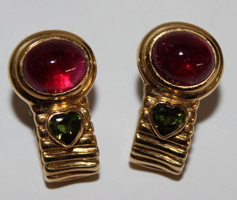 18Kt YG 13.32ct Tourmaline Earrings: 18Kt YG 13.32ct Tourmaline Earrings, features a Bvlgari style fluted hoop design terminating with two large oval cabochon cut pink tourmaline's (rubelite) weighing approx. 10.32cts combined and exhibi