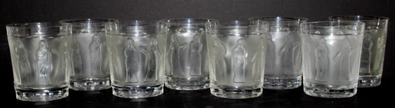 8 Pc. Lalique 'Femmes' Crystal Whiskey Tumblers: 8 Pc. Lalique 'Femmes' Crystal Whiskey Tumblers. All marked "Lalique France". Depicting madonnas throughout. Measures - 4" high x 3 5/8" diameter.
