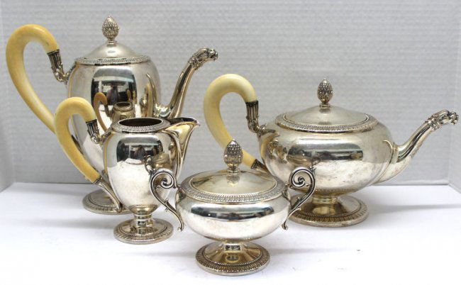 4 Pc. European 800 Silver & Ivory Handled Tea Set: 4 Pc. European 800 Silver & Ivory Handled Tea Set. Coffee pot - 9" high x 10 1/2" wide, tea pot - 7" high x 12" wide, creamer - 6 1/2" high x 6 1/2" wide, sugar bowl - 5" high x 6 1/2" wide. Weighs -
