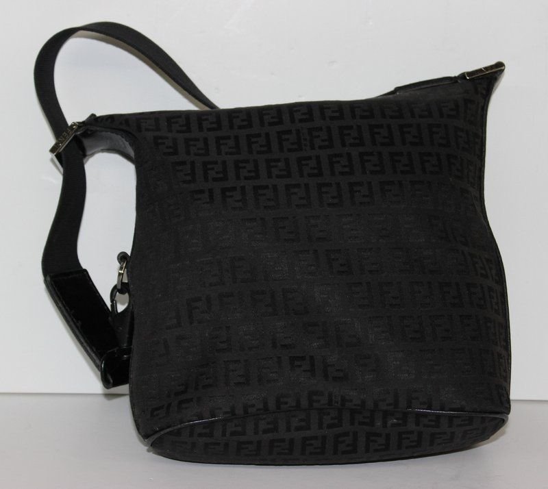 Authentic Fendi Black Monogram Purse: Authentic Fendi Black Monogram Purse with black lettering on black fabric background and strap with dust bag. Measures - 10" x 9".