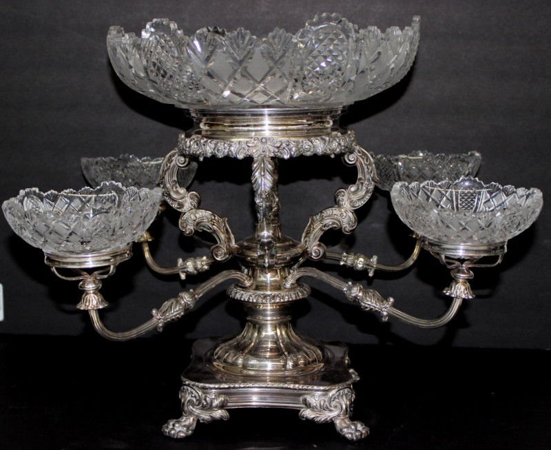 Impressive European Silver-Plated Epergne: Impressive European Silver-Plated Epergne, with European cut glass inserts. Each cut crystal and silver-plated inserts are removable. Measures - 15" high x 17 1/2" wide.