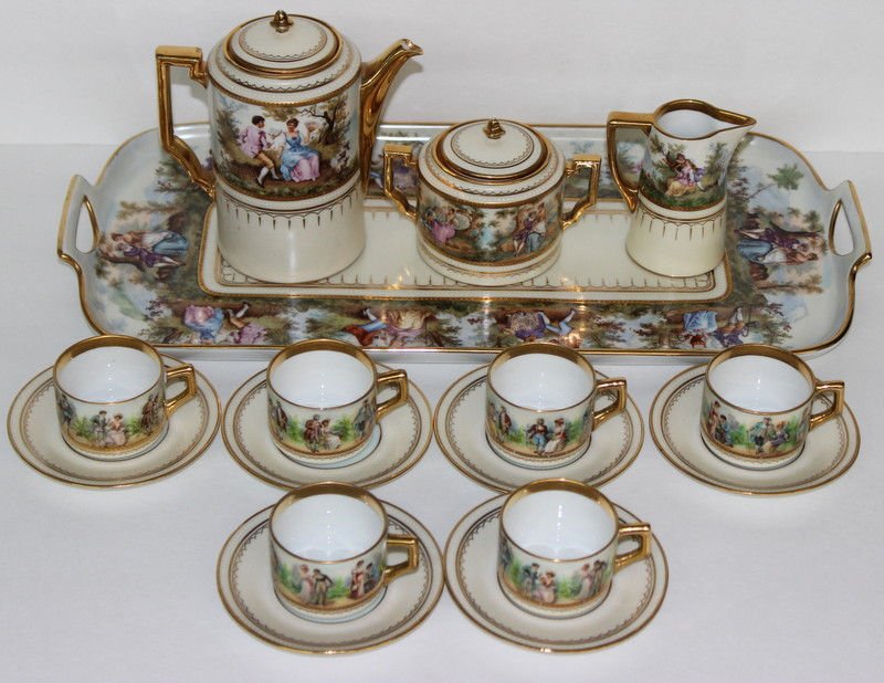 16 Pc. Royal Vienna Porcelain Tea Set: 16 Pc. Royal Vienna Porcelain Tea Set. 6 cups - 1 1/2" high, 6 saucers - 4 1/4" diameter, 1 tray - 18 1/4", tea pot - 6" high, creamer - 3 1/8" high, sugar - 3" high.