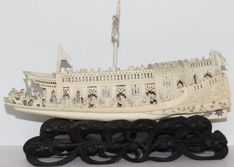 Chinese Finely Carved Ivory Ship: Chinese Finely Carved Ivory Ship on rosewood stand. Total measures - 7 1/2" high x 10 1/2" long, ivory - 5 5/8" high x 10 3/8" long. Weighs - 482.9 grams.