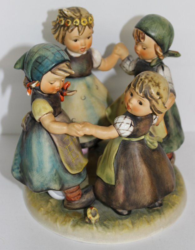 Hummel Ring Around The Rosie Figural Group: Hummel Ring Around The Rosie Figural Group. Measures - 7" high x 6" diameter. Figure modeled in 1957 by Master sculptor Gerhard Skrobele but not released until 1960 for 25th Anniversary of M.I. Hummel