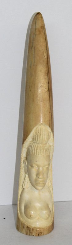 Solid African Carved Erotic Ivory Tusk: Solid African Carved Erotic Ivory Tusk. Measures - 11 7/8" high. Weighs - 681.5 grams.