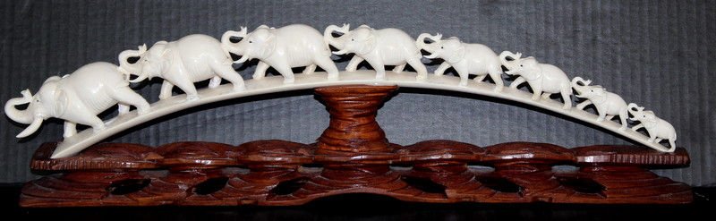 Extremely Fine Carved African Ivory Tusk: Extremely Fine Carved African Ivory Tusk. Featuring elephants on a bridge. Weighs - 1309.5 grams with base. Measures - 6" high x 21 1/2" long. Please Contact - Tom at the UPS Store (561-739-9180) (tup