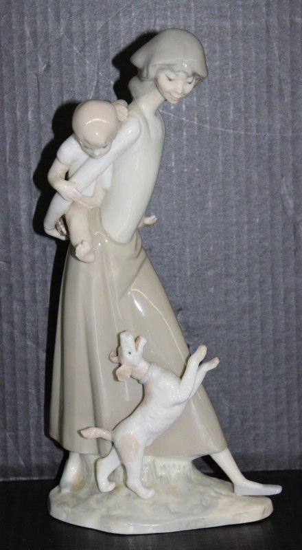 Lladro Style "Mother w/ Child & Puppy" Made in Spain: Lladro Style "Mother w/ Child & Puppy" Made in Spain. Measures - 11 1/4" high x 5" wide.