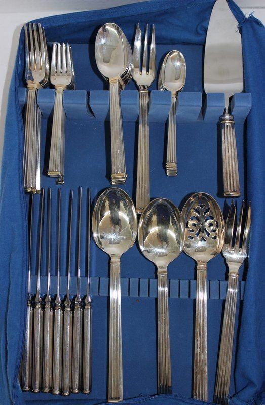 51 Pc. Christofle France 'Triade Gold' Silver Plated: 51 Pc. Christofle France 'Triade Gold' Silver Plated Flatware Set. 7 dinner forks - 8" long, 8 salad forks - 6 1/2" long, 8 dinner spoons - 7 1/2" long, 7 tea spoons - 6" long, 8 dinner knives - 9 3/4