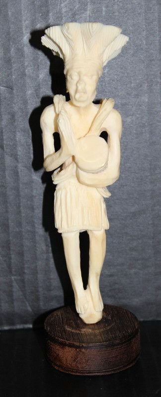 Finely Carved African Ivory Figure: Finely Carved African Ivory Figure. Ivory - 6 1/2" high, total - 7 1/2" high. Weighs - 139.9 grams.