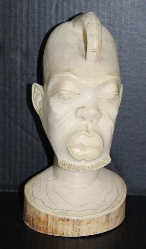 Finely Carved African Ivory Tribal Head: Finely Carved African Ivory Tribal Head. Weighs - 290 grams. Measures - 10 1/2" high.