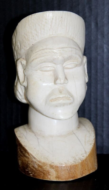 Finely Carved African Ivory Tribal Head: Finely Carved African Ivory Tribal Head. Weighs - 153.6 grams. Measures - 7 1/2" high.