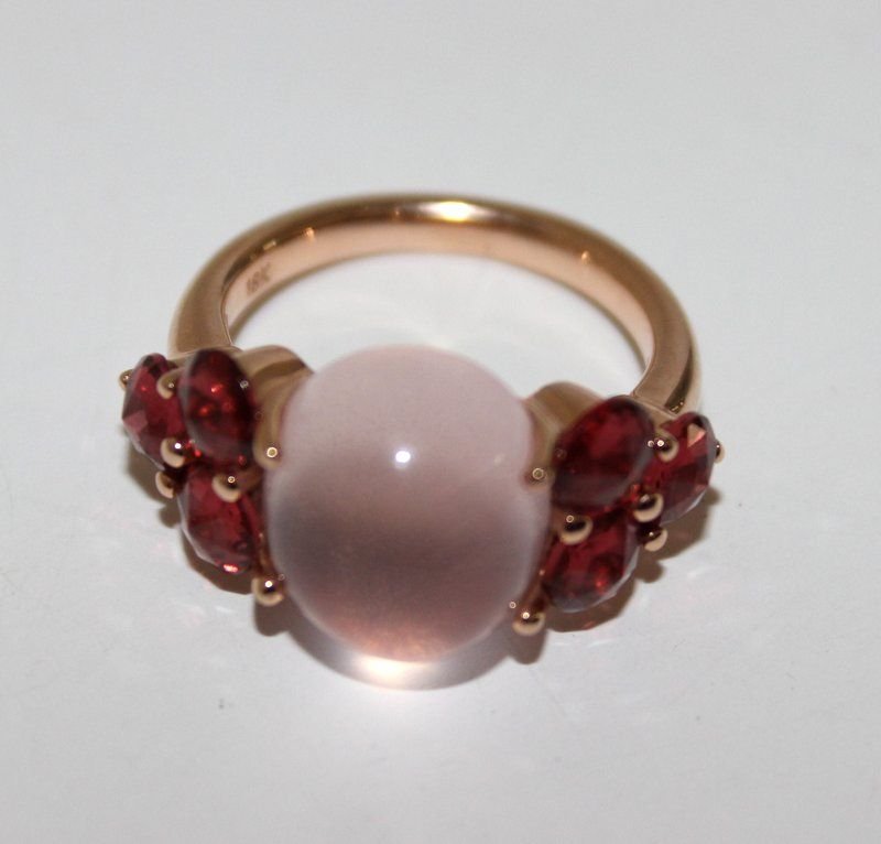 Pomellato 18KT Rose Gold Quartz & Amethyst Ring: Pomellato 18KT Rose Gold Quartz & Amethyst Ring. This Luna Model ring features a magnificent cabachon rose quartz center stone enhanced by 5 x Full cut amethyst. Marked 18KT 4.5 DWT