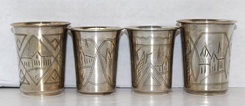 4 18TH C. RUSSIAN SILVER BEAKERS: 4 18TH C. RUSSIAN SILVER BEAKERS. RANGING IN HEIGHT FROM 3 3/8"H - 2 1/2"H. WEIGHING AT 4.745ozt TOTAL.