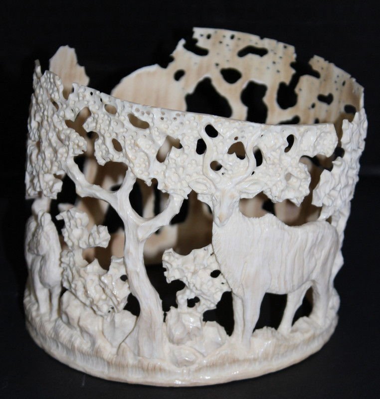 FINELY CARVED AFRICAN IVORY TUSK: FINELY CARVED AFRICAN IVORY TUSK. 3 3/4"H X 5 1/4"DIA. 179.4g