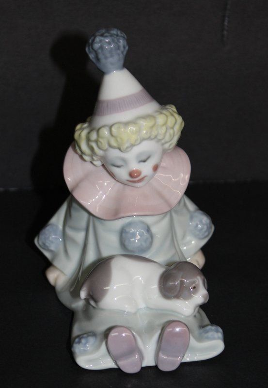 Lladro 'Pierrot w/ Puppy' #5277 Porcelain Group: Lladro 'Pierrot w/ Puppy' #5277 Porcelain Group, issued - 1985, retired - 2007, sculptor - Jose Puche. Measures - 4 1/4" high.