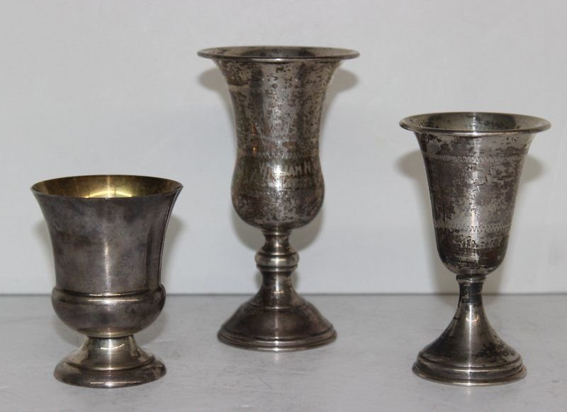 3 Pc. Sterling Kiddish Cups: 3 Pc. Sterling Kiddish Cups, all marked sterling, one is marked Gorham. Measures vary - 3" - 4 3/4" high. Weighs - 4.80 troy oz.