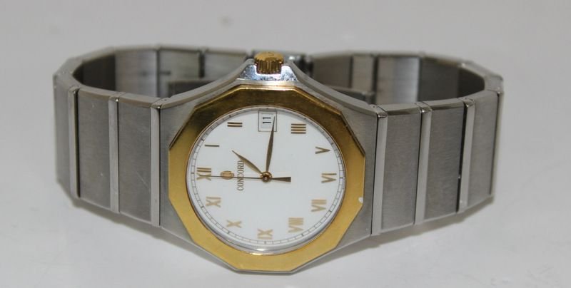 Concord 18Kt YG & Stainless Mens Watch: Concord 18Kt YG & Stainless Mens Watch, featuring a brushed steel finish w/ 18Kt YG bezel made in Switzerland. in original box.