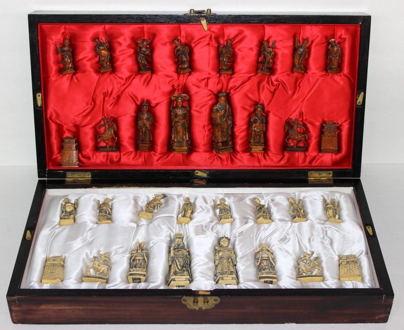 36 Pc. Chinese Finely Carved Ivory Chess Set: 36 Pc. Chinese Finely Carved Ivory Chess Set. Smallest - 2" high, largest - 4" high. Approx. weight - 600 grams. Measures - 4 3/8" high x 20 long x 10" deep - when closed.