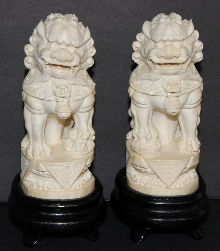 Pair Of Chinese Carved Ivory Foo Dogs