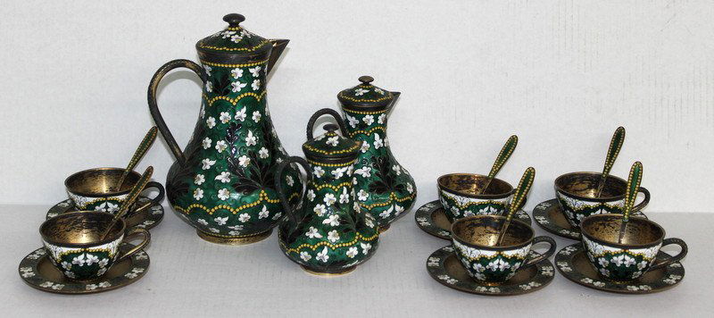 21 Pc. Russian Silver Enameled Tea Set: 21 Pc. Russian Silver Enameled Tea Set. 1 small tea pot - 5 1/2" high, 1 medium tea pot - 6 1/4" high, 1 large tea pot - 8 1/2" high, 6 tea cups - 1 7/8" high x 3 3/4" wide, 6 spoons - 4 5/8" long, 6