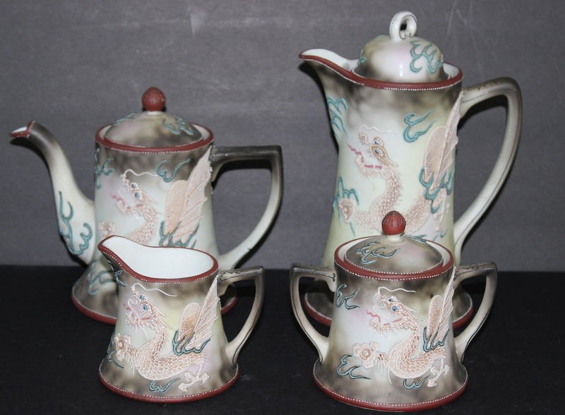 4 Pc. Nippon Japanese Dragonware Moriage Tea & Coffee: 4 Pc. Nippon Japanese Dragonware Moriage Tea & Coffee Set. Sugar - 4" high, creamer - 4 1/2" high, coffee - 6" high, tea pot - 9 1/2" high.