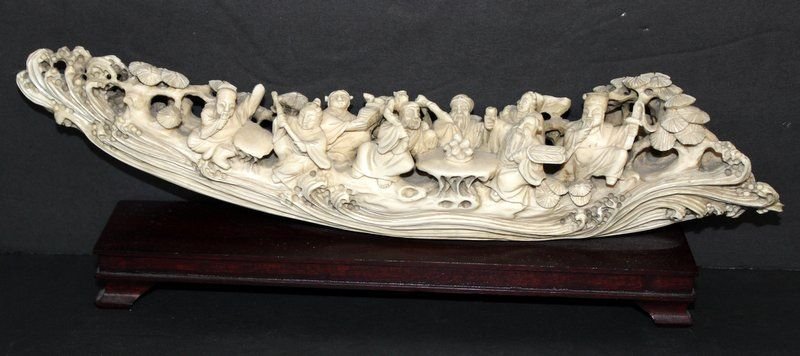 Antique Chinese Carved Ivory Figural Tusk: Antique Chinese Carved Ivory Figural Tusk. Measures - 4 1/4" high x 13 1/4" long. Weight - 794.7 grams, including base. INTERNATIONAL CLIENTS ARE INELIGIBLE TO BID ON THIS ITEM. THIS ITEM IS FOR SALE 