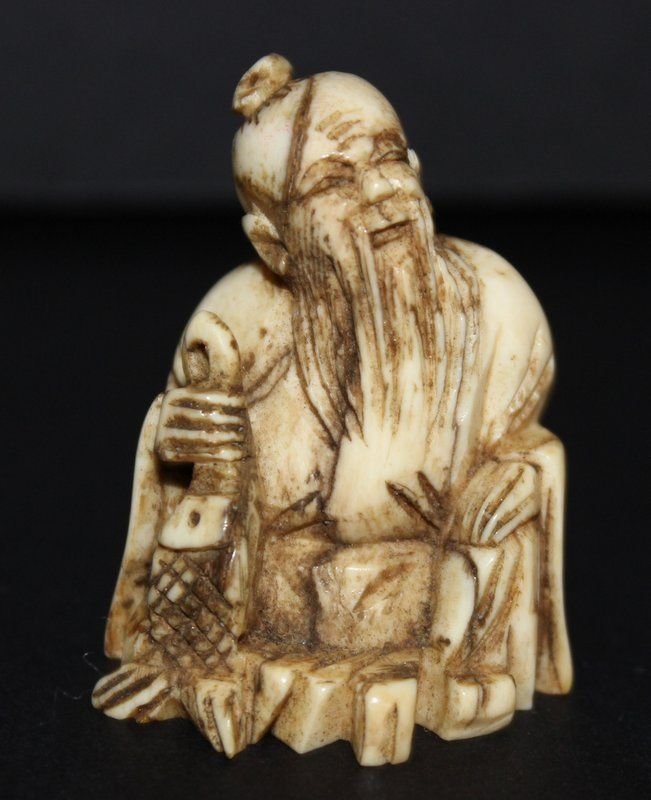 Japanese Carved Ivory Netsuke: Japanese Carved Ivory Netsuke. Measures approx. - 2" high. Weight - 14.2 grams. INTERNATIONAL CLIENTS ARE INELIGIBLE TO BID ON THIS ITEM. THIS ITEM IS FOR SALE ONLY WITHIN THE UNITED STATES, EXCEPT NO