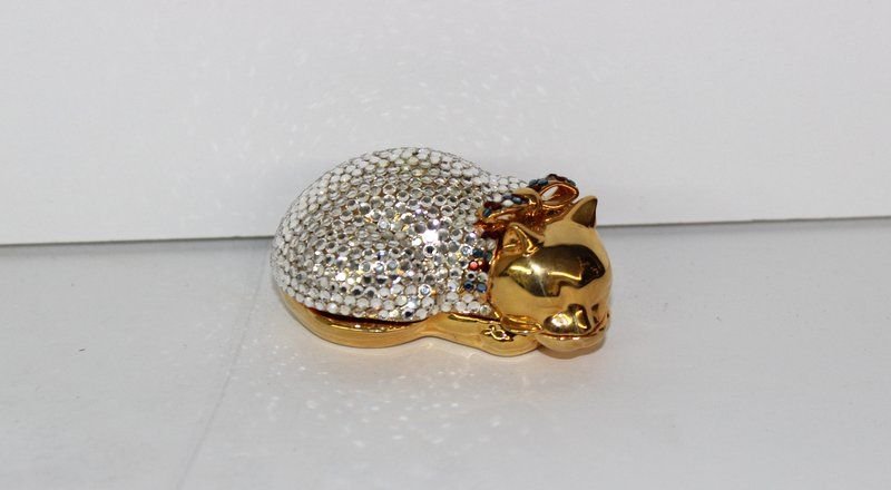 Judith Leiber Laying Cat Pill Box: Judith Leiber Laying Cat Pill Box with Swarovski crystals. Measures - 2 1/4" long. With original pouch.