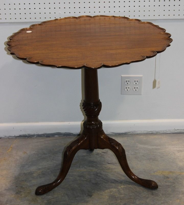 Chippendale Tilt Top Carved Piecrust Table: Chippendale Tilt Top Carved Piecrust Table, spliced foot. Measures - 28" high x 29 1/2" wide.