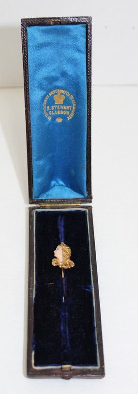 Beautiful Art Nouveau Enamel Stick Pin: Beautiful Art Nouveau Enamel Stick Pin that comes with the original fitted box. It features a young maidens bust with long flowing hair and polychromed enamel face wearing a large tiara. It is very ty