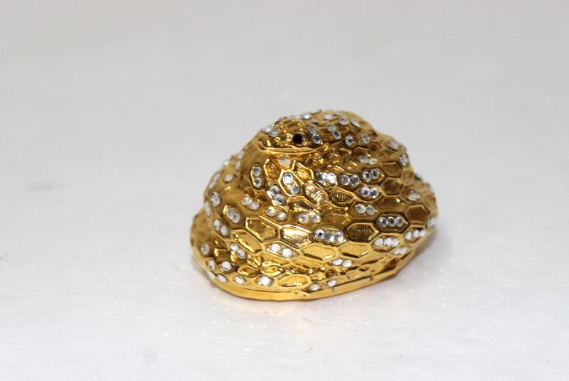 Judith Leiber Swarovski Crystal Snake Pill Box: Judith Leiber Swarovski Crystal Snake Pill Box. Measures - 2" long. Weight - 30.9 grams.