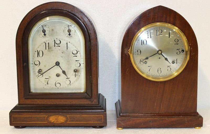 2 American Mahogany Mantle Clocks: 2 American Mahogany Mantle Clocks. Seth Thomas, the other maker unknown. One measures - 15 1/2" high x 11 1/2" wide, other measures - 14 1/2" high x 10" wide.