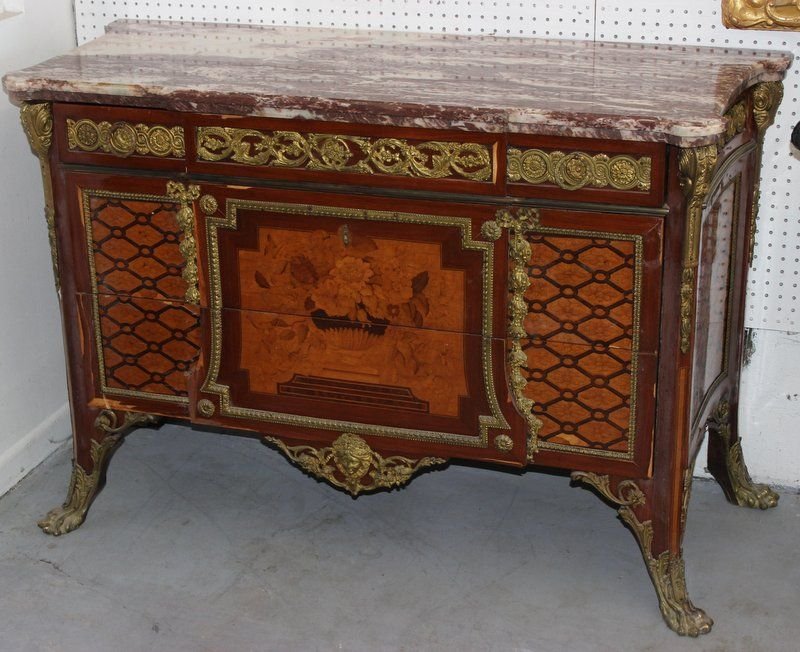 Louis XV/XVI Style Bronze Marble & Various Wood Commode: Louis XV/XVI Style Bronze Marble & Various Wood Commode. Circa 1900. The breakfront rectangular white and liver mottled marble top above a conforming case with a frieze with three drawers applied with