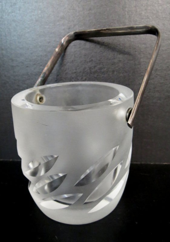 Lalique Small Ice Bucket w/ Handle: Lalique Small Ice Bucket w/ Handle, frosted glass with cut clear spear motif. Square metal handle. Measures - 4 1/2" high x 4 3/4" wide. Engraved signature on base. C. 1978 Retired. Condition is mint.