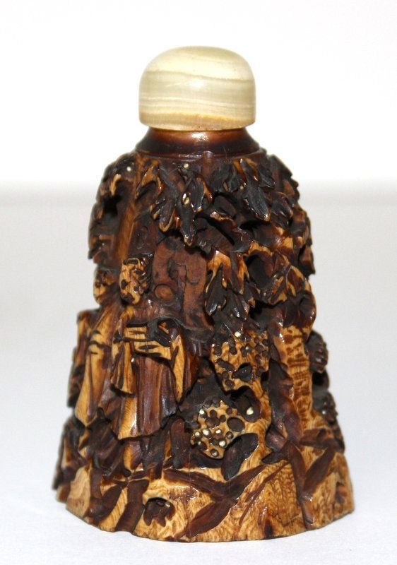 Chinese Ivory Carved Snuff Bottle: Chinese Ivory Carved Snuff Bottle. Measures - 2 1/2" high. INTERNATIONAL CLIENTS ARE INELIGIBLE TO BID ON THIS ITEM. THIS ITEM IS FOR SALE ONLY WITHIN THE UNITED STATES, EXCEPT NOT TO CALIFORNIA, NEW