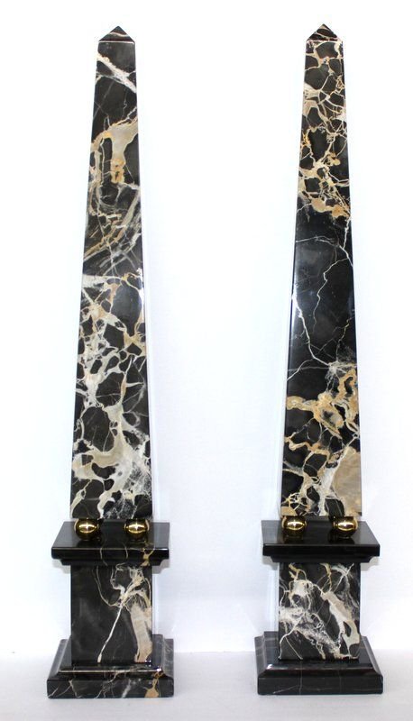 Pair of Magnificent Carrera Marble Obelisks: Pair of Magnificent Carrera Marble Obelisks on matching marble plinths with brag accents. Each measure 26" high.