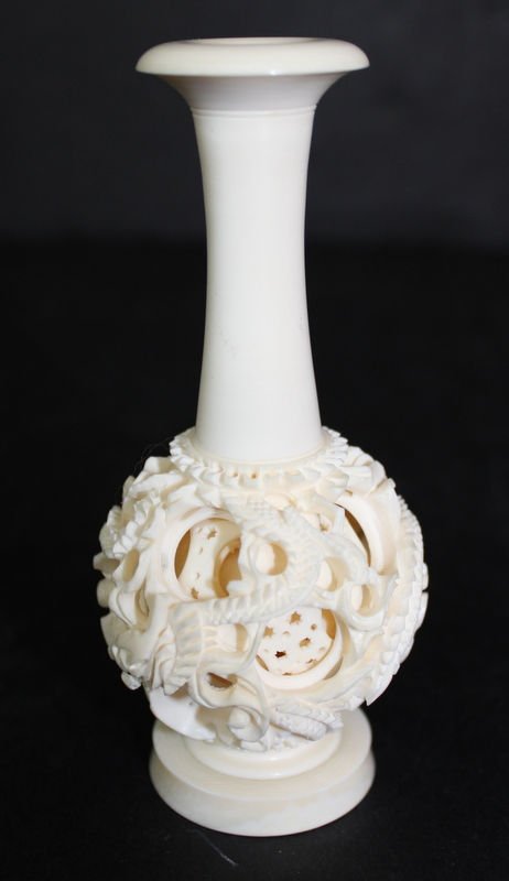 Chinese Ivory Puzzle Ball Vase: Chinese Ivory Puzzle Ball Vase. Measures - 5 1/4" high. INTERNATIONAL CLIENTS ARE INELIGIBLE TO BID ON THIS ITEM. THIS ITEM IS FOR SALE ONLY WITHIN THE UNITED STATES, EXCEPT NOT TO CALIFORNIA, NEW YOR