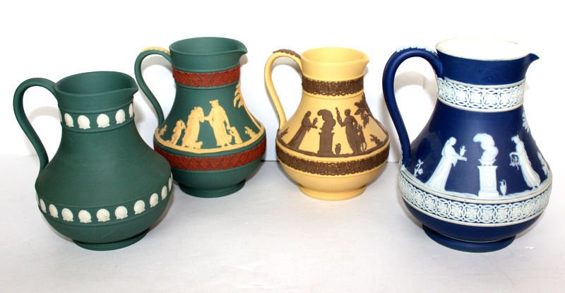 4 Pc. Wedgwood Misc. Color Jasperware Pitchers: 4 Pc. Wedgwood Misc. Color Jasperware Pitchers. Measures vary - 5" to 6".