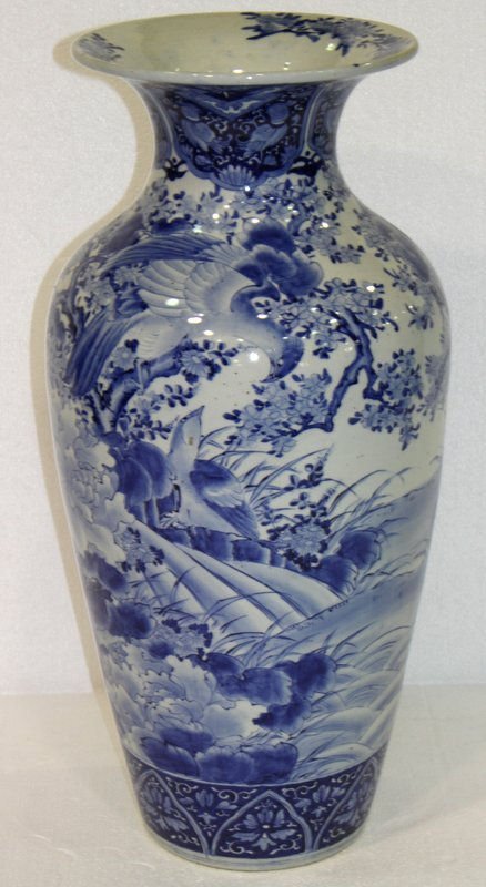 Chinese Blue & White Porcelain Floor Vase: Chinese Blue & White Porcelain Floor Vase. Decorated with typical oriental foliage, wildlife and landscape. Measures - 31" high x 12" diameter.