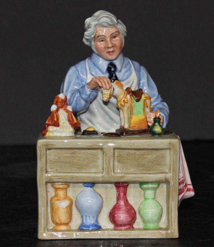 Royal Doulton "The China Repairer" HN2943 Figure: Royal Doulton "The China Repairer" HN2943 Figure. Measures - 6 3/4" high.