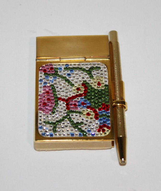 Judith Leiber Pad & Pen Holder: Judith Leiber Pad & Pen Holder. Measures - 2 1/4" x 1 1/2". Comes with original pouch. Original retail - $245.