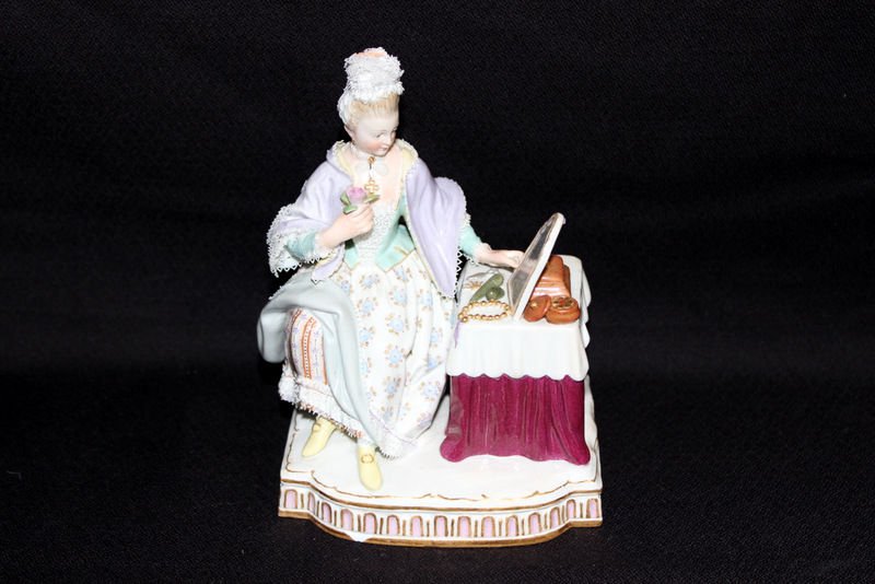 Meissen Hand Painted Porcelain Woman: Meissen Hand Painted Porcelain Woman. AS IS. Depicting woman looking in mirror. Measures - 5 1/2" high x 4 1/2" wide.