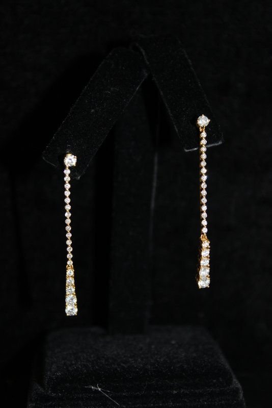 Bucherer 18Kt YG 1.28ct. Diamond Earrings: Bucherer 18Kt YG 1.28ct. Diamond Earrings. Retail - $7,150. Weight - 4 grams.