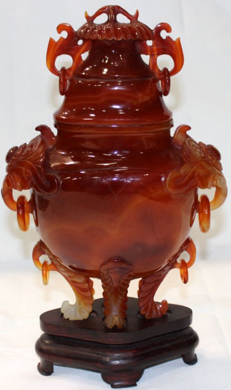 Chinese Carved Carnelian Censer: Chinese Carved Carnelian Censer. Measures - 11" high x 8 1/4" wide, total with fitted base - 13 1/2" high.