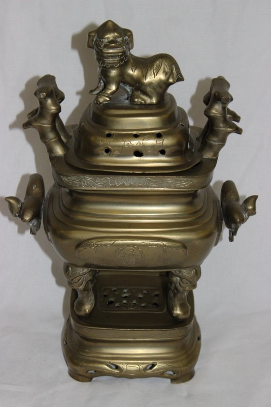 Chinese Bronze Incense Burner: Chinese Bronze Incense Burner. Measures - 15 3/4" high x 11" wide.