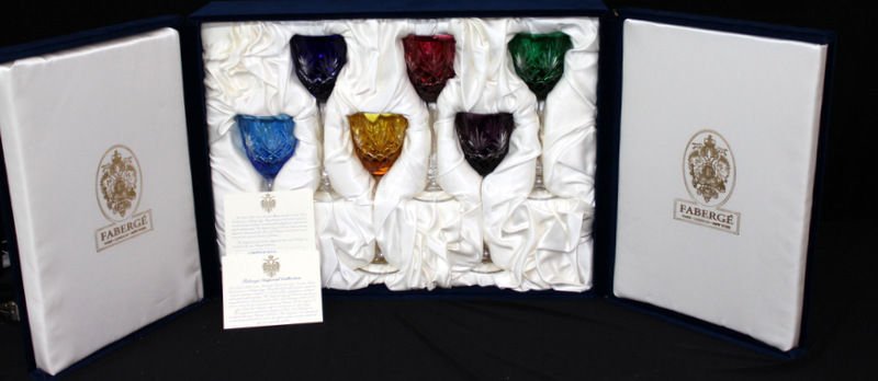 6 Pc. Faberge Odessa Wine Glasses Boxed: 6 Pc. Faberge Odessa Wine Glasses Boxed. Set of crystal wine glasses by Faberge in original box in papers. 8 1/2" high cobalt, yellow, amethyst, green, pink & light blue.