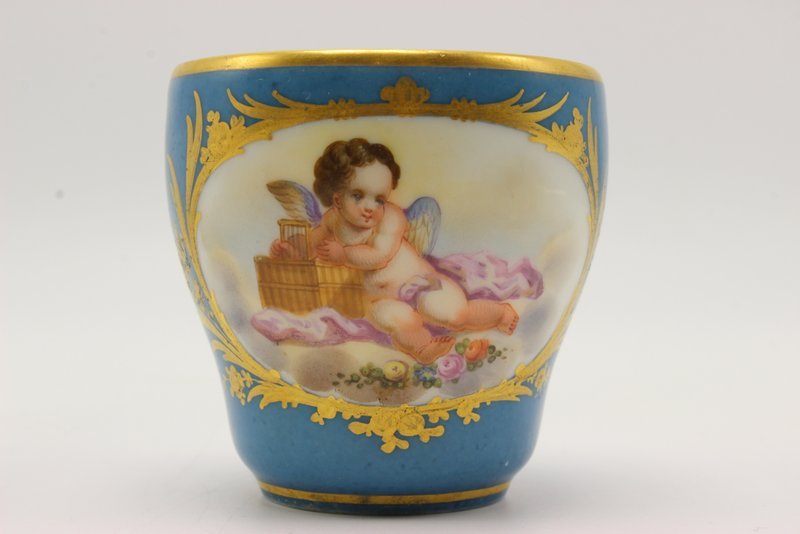 French Hand Painted Porcelain Portrait Cup: French Hand Painted Porcelain Portrait Cup. Measures - 2 1/2" High, depicting cherub.