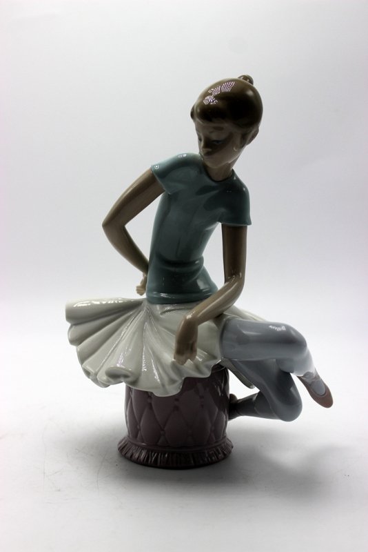 Lladro "Julia" #1361 Porcelain Figure: Lladro "Julia" #1361 Porcelain Figure. Measures - 8 1/2" high.